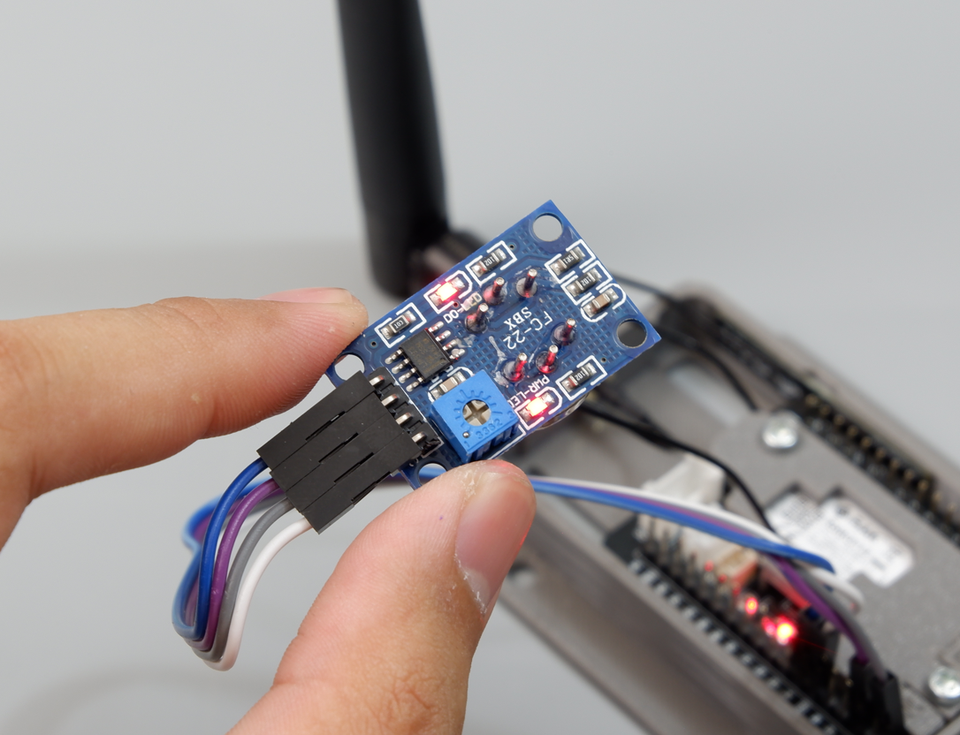 Rear view of the MQ-2 module showing the blue trimmer potentiometer, power LED, and digital output alarm LED