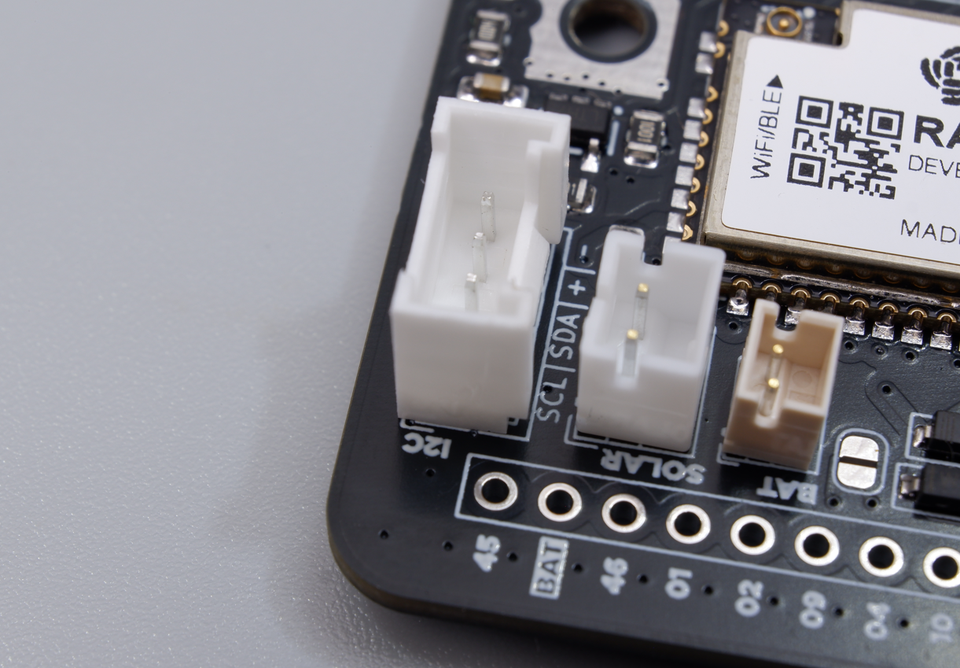 The I2C connector (JST) on the Cubicore Devboard, labeled SCL/SDA/+/−